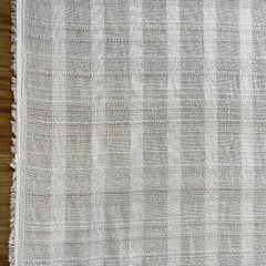 אריג כותנה שמנת בפסים שקופים