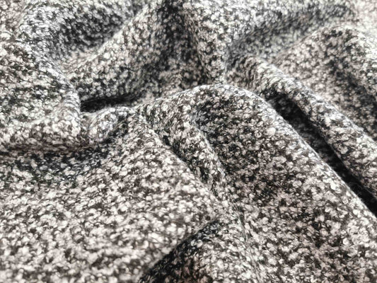 אריג בוקלה שלג שחור