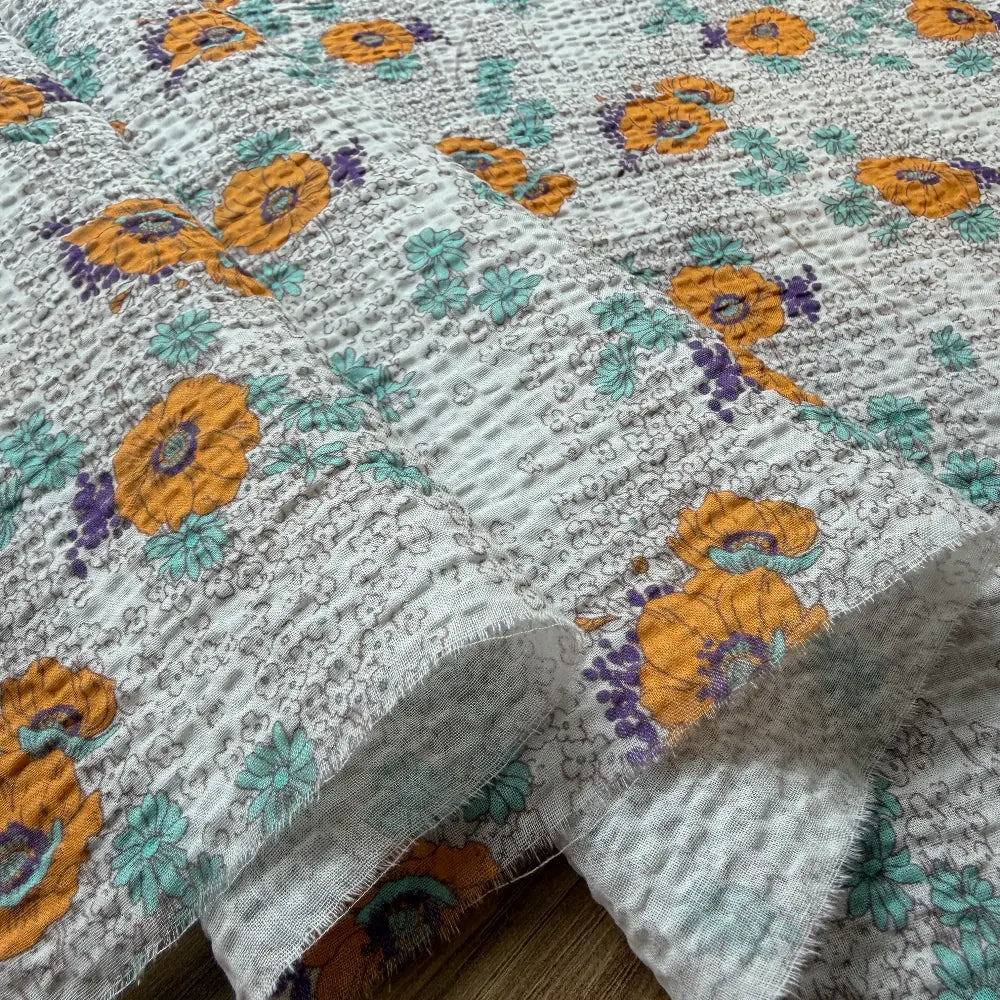 בד כותנה סירסאקר פרחוני בגווני פסטל