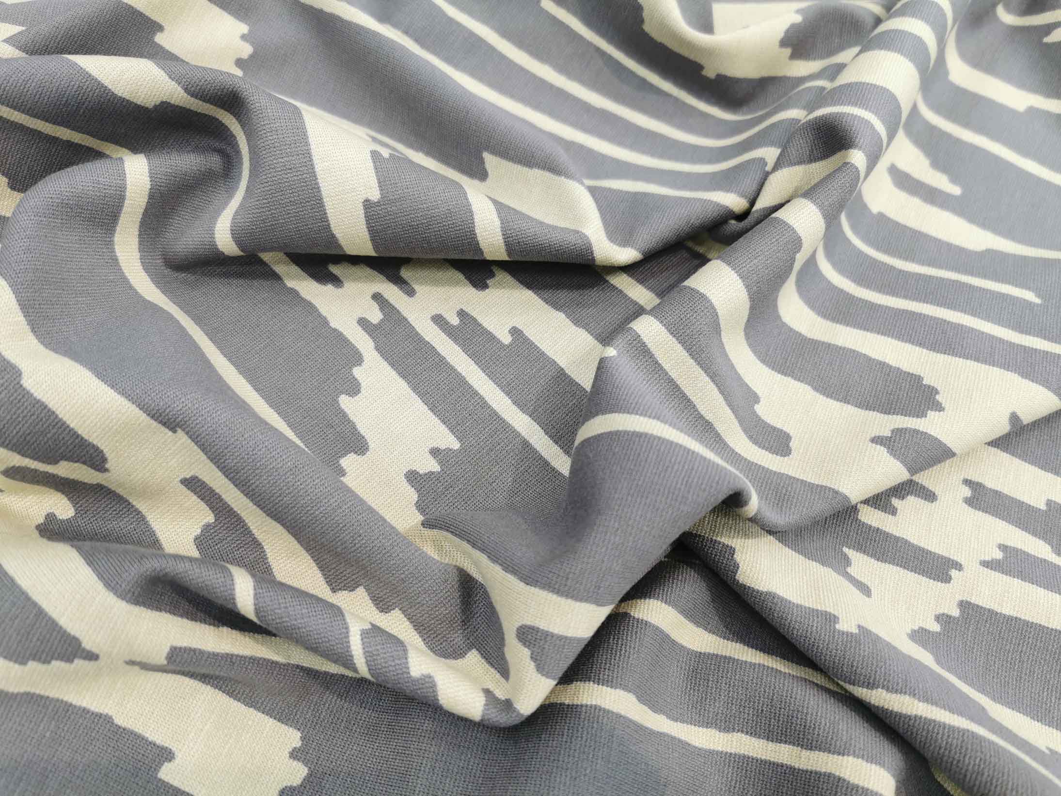 סריג ג'רסי ויסקוזה ספריי גרפי אפור