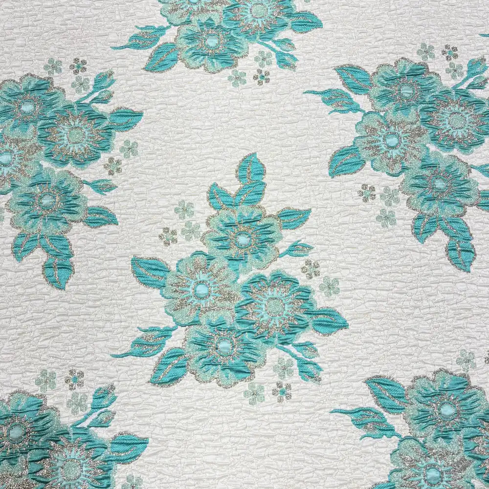 ברוקד פרח מצולות צפוף על רקע שמנת טורקיז